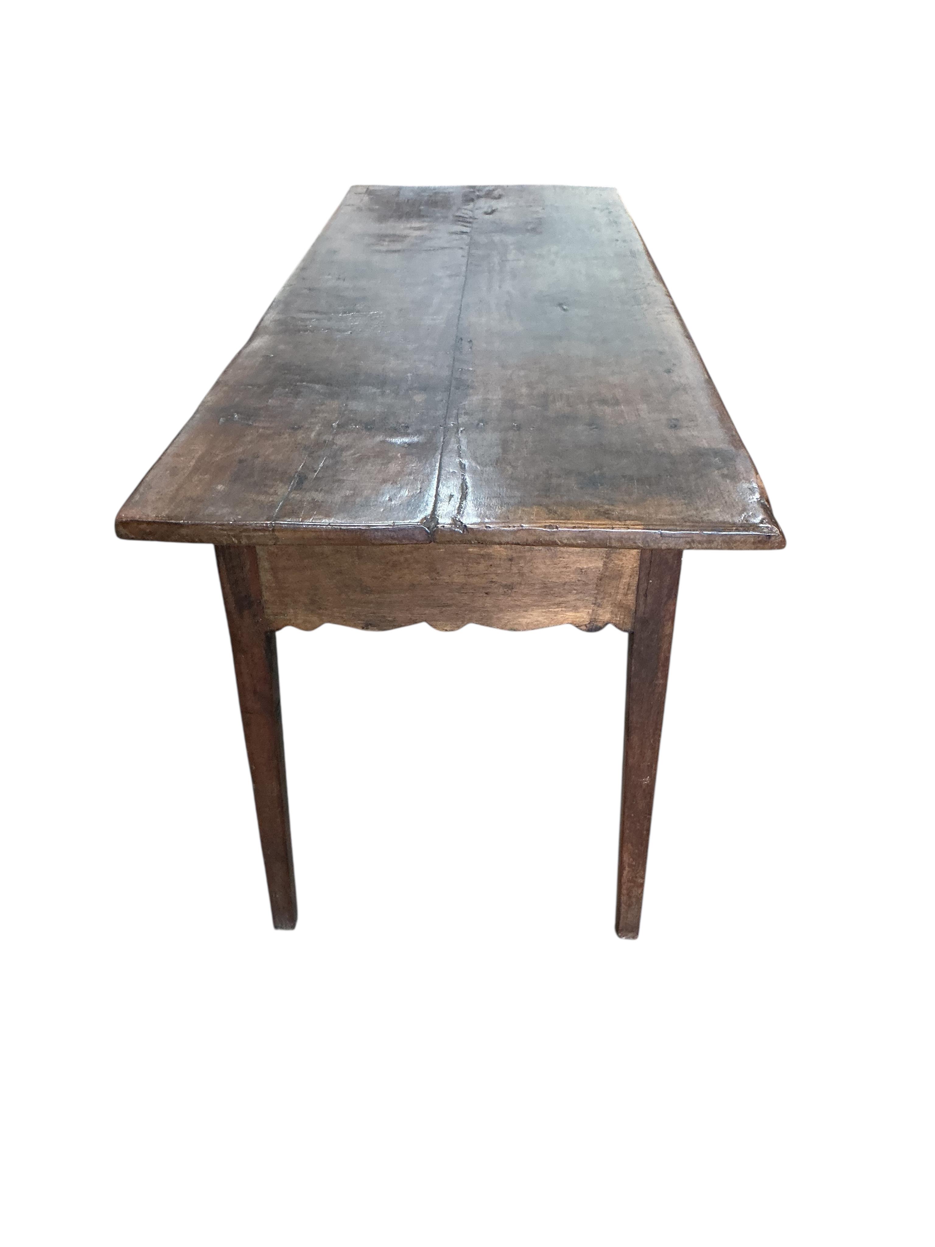 A Continental hardwood serving table, width 150cm, depth 54cm, height 71cm